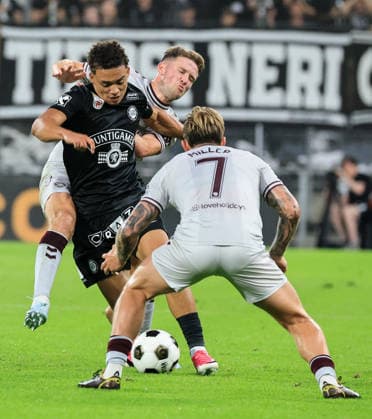 SOCCER - UEFA CL, Sturm vs Hearts GRAZ,AUSTRIA,21.JUL.26 - SOCCER - UEFA Champions League, qualification, SK Sturm Graz vs Heart of Midlothian FC. Image shows Calvin Miller (Hearts) and Jacob Peter Hoedl (Sturm).  GEPAxpictures xWolfgangxGrebien