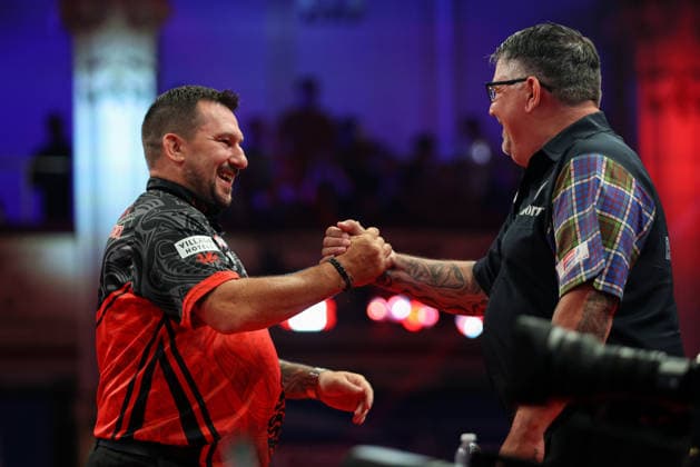 RECORD DATE NOT STATED 21st July 2026, Winter Gardens, Blackpool, Lancashire, England; 2026 Betfred World Matchplay Darts, Day Four; Jonny Clayton and Gary Anderson shake hands ahead of the game AidanxHunter