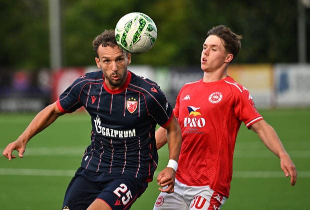 UEFA Champions League Second Qualifying Round First Leg, Inver Park, Belfast, Northern Ireland 21 7 2026 Larne vs Crvena Zvezda Larnes Matty Lusty with Crvena Zvezda™s Strahinja Erakovic Matty Lusty with Strahinja Erakovic 21 7 2026  Copyright: xx Larne v Crvena Zvezda-020