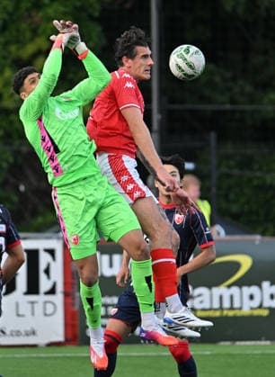 UEFA Champions League Second Qualifying Round First Leg, Inver Park, Belfast, Northern Ireland 21 7 2026 Larne vs Crvena Zvezda Larnes Mathew Ridley with Crvena Zvezda™s Matheus Magalhaes Mathew Ridley with Matheus Magalhaes 21 7 2026  Copyright: xx Larne v Crvena Zvezda-024