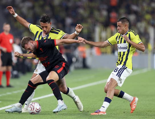 Fenerbahce v Gornik Zabrze - UEFA Champions League Second Qualifying Round ISTANBUL, TURKIYE - JULY 21: Irfan Can Kahveci (rear) and Bartug Elmaz (28) of Fenerbahce in action against Erik Prekop (11) of Gornik Zabrze during the UEFA Champions League second qualifying round first-leg match against Gornik Zabrze at Chobani Stadium in Istanbul, Turkiye, on July 21, 2026. Ali Atmaca Anadolu Istanbul Turkey. Editorial use only. Please get in touch for any other usage.  Copyright: x2026xAnadoluxAlixAtmacax