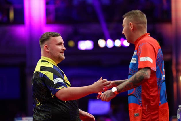 RECORD DATE NOT STATED 21st July 2026, Winter Gardens, Blackpool, Lancashire, England; 2026 Betfred World Matchplay Darts, Day Four; Luke Littler and Nathan Aspinall shaking hands ahead of their game AidanxHunter