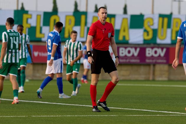 UEFA‘appointed match referee Marius Hansen Grotta (centre) looks on during the UEFA Conference League Second qualifying round, first‘leg match between Floriana and Drita at Centenary Stadium, Ta™ Qali, Malta, on 21 July 2026. Floriana v Drita - UEFA Conference League Second Qualifying Round 1st Leg