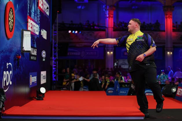 RECORD DATE NOT STATED 21st July 2026, Winter Gardens, Blackpool, Lancashire, England; 2026 Betfred World Matchplay Darts, Day Four; Luke Littler throws all three darts at once whilst practicing during the break interval AidanxHunter