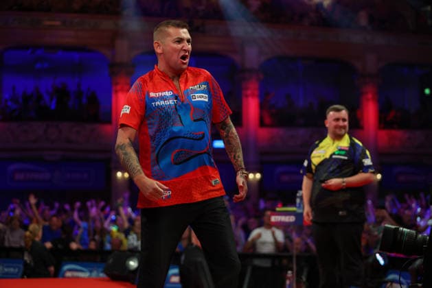 RECORD DATE NOT STATED 21st July 2026, Winter Gardens, Blackpool, Lancashire, England; 2026 Betfred World Matchplay Darts, Day Four; Nathan Aspinall reacts after taking out 170 as Luke Littler looks on AidanxHunter