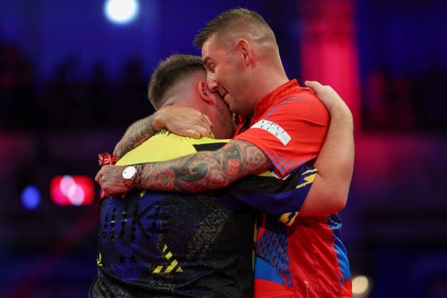 RECORD DATE NOT STATED 21st July 2026, Winter Gardens, Blackpool, Lancashire, England; 2026 Betfred World Matchplay Darts, Day Four; Luke Littler and Nathan Aspinall hug at the end of the match AidanxHunter