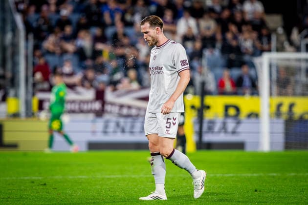 STURM GRAZ - HEARTS Jamie McCart of Hearts spits after the first leg of second qualifying round of UEFA Champions League football match between Sturm Graz and Heart of Midlothian FC at the Merkur Arena (Stadion Graz Liebenau). Graz, Austria, July 21, 2026. Photo by Branislav Racko Copyright: xx 080A2686