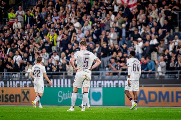 STURM GRAZ - HEARTS Jamie McCart, Tomas Magnusson, Malachi Fagan Walcott of Hearts sad after the first leg of second qualifying round of UEFA Champions League football match between Sturm Graz and Heart of Midlothian FC at the Merkur Arena (Stadion Graz Liebenau). Graz, Austria, July 21, 2026. Photo by Branislav Racko Copyright: xx _BRR6532