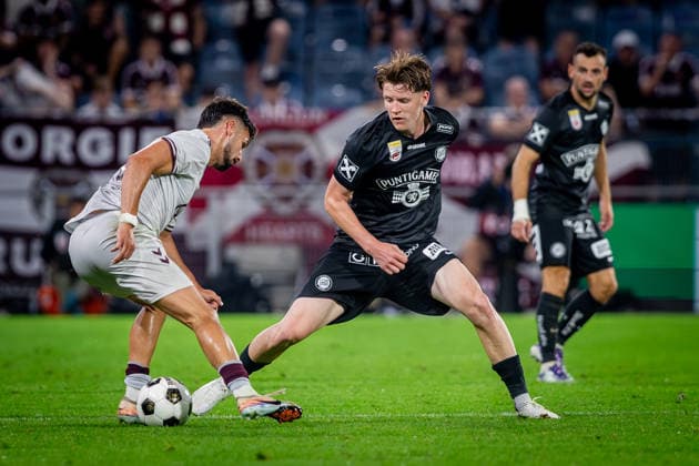 STURM GRAZ - HEARTS Luca Weinhandl of Sturm and Claudio Braga of Hearts during the first leg of second qualifying round of UEFA Champions League football match between Sturm Graz and Heart of Midlothian FC at the Merkur Arena (Stadion Graz Liebenau). Graz, Austria, July 21, 2026. Photo by Branislav Racko Copyright: xx 080A2189
