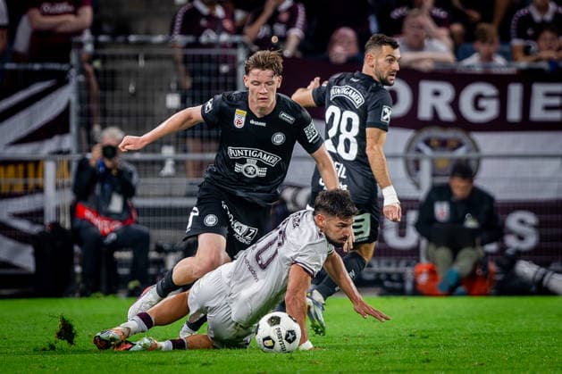 STURM GRAZ - HEARTS Luca Weinhandl of Sturm and Claudio Braga of Hearts during the first leg of second qualifying round of UEFA Champions League football match between Sturm Graz and Heart of Midlothian FC at the Merkur Arena (Stadion Graz Liebenau). Graz, Austria, July 21, 2026. Photo by Branislav Racko Copyright: xx 080A2216