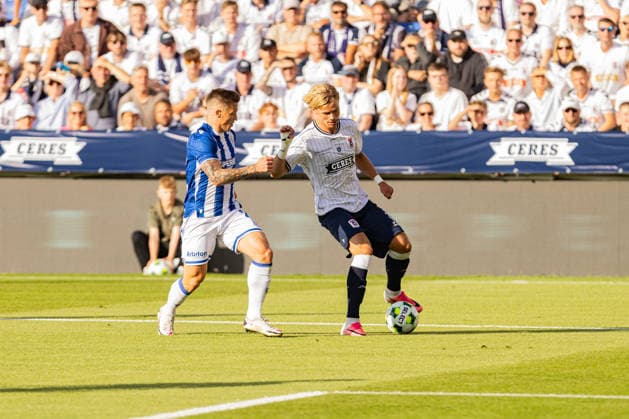 Aarhus GF v Lech Poznan, UEFA Champions League qualification, Randers, Denmark Randers, Denmark. 21st, July 2026. Frederik Emmery (R) of Aarhus GF seen during the UEFA Champions League qualification match between Aarhus GF F and Lech Poznan at Randers Stadion in Randers. Denmark, Randers  Copyright: xGonzalesxPhoto RasmusxJensenx