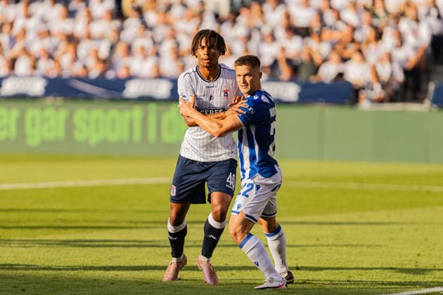 Aarhus GF v Lech Poznan, UEFA Champions League qualification, Randers, Denmark Randers, Denmark. 21st, July 2026. Jonas Jensen-Abbew (40) of Aarhus GF and Radoslaw Murawski (22) of Lech Poznan seen during the UEFA Champions League qualification match between Aarhus GF F and Lech Poznan at Randers Stadion in Randers. Denmark, Randers  Copyright: xGonzalesxPhoto RasmusxJensenx
