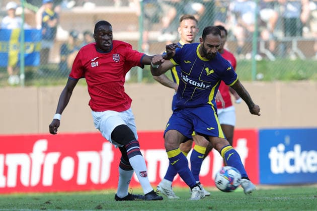 IPA86903645 - Grigoris Kastanos of Hellas Verona FC takes a shot on goal during the friendly match between Hellas Verona and Virtus Verona at the Sporting Center La Pineta on July 22, 2026, in Folgaria, VI.  Copyright: xEmanuelexPennacchio IPAxSportx xx 86903645