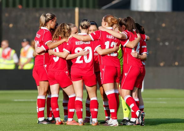 Wrexham, Wales, 22nd July 2026. The players of Wrexham have a team huddle ahead of the Pyunik v Wrexham Women UEFA Womens Champions League Qualifying match at The Racecourse, Wrexham. Picture credit should read: Cody Froggatt Sportimage EDITORIAL USE ONLY. No use with unauthorised audio, video, data, fixture lists, club league logos or live services. Online in-match use limited to 120 images, no video emulation. No use in betting, games or single club league player publications. SPI_006_CF_PYUNIK_V_WREXHAM_WOMEN SPI-4881-0006