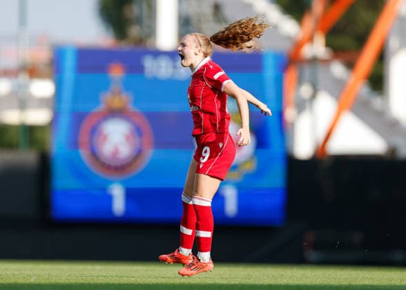 Wrexham, Wales, 22nd July 2026. Katie Barker of Wrexham celebrates scoring their sides first goal during the Pyunik v Wrexham Women UEFA Womens Champions League Qualifying match at The Racecourse, Wrexham. Picture credit should read: Cody Froggatt Sportimage EDITORIAL USE ONLY. No use with unauthorised audio, video, data, fixture lists, club league logos or live services. Online in-match use limited to 120 images, no video emulation. No use in betting, games or single club league player publications. SPI_010_CF_PYUNIK_V_WREXHAM_WOMEN SPI-4881-0010