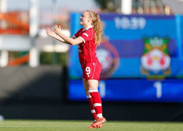 Wrexham, Wales, 22nd July 2026. Katie Barker of Wrexham celebrates scoring their sides first goal during the Pyunik v Wrexham Women UEFA Womens Champions League Qualifying match at The Racecourse, Wrexham. Picture credit should read: Cody Froggatt Sportimage EDITORIAL USE ONLY. No use with unauthorised audio, video, data, fixture lists, club league logos or live services. Online in-match use limited to 120 images, no video emulation. No use in betting, games or single club league player publications. SPI_011_CF_PYUNIK_V_WREXHAM_WOMEN SPI-4881-0011