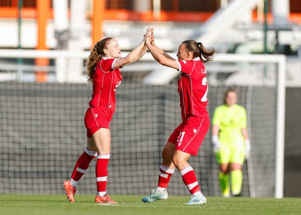 Wrexham, Wales, 22nd July 2026. Katie Barker of Wrexham celebrates scoring their sides first goal during the Pyunik v Wrexham Women UEFA Womens Champions League Qualifying match at The Racecourse, Wrexham. Picture credit should read: Cody Froggatt Sportimage EDITORIAL USE ONLY. No use with unauthorised audio, video, data, fixture lists, club league logos or live services. Online in-match use limited to 120 images, no video emulation. No use in betting, games or single club league player publications. SPI_012_CF_PYUNIK_V_WREXHAM_WOMEN SPI-4881-0012