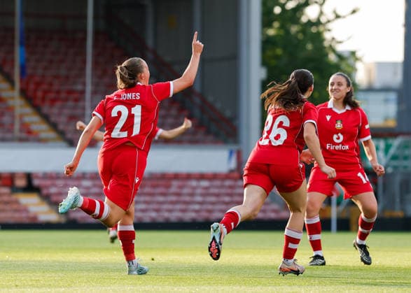 Wrexham, Wales, 22nd July 2026. Lili Jones of Wrexham celebrates scoring their sides second goal during the Pyunik v Wrexham Women UEFA Womens Champions League Qualifying match at The Racecourse, Wrexham. Picture credit should read: Cody Froggatt Sportimage EDITORIAL USE ONLY. No use with unauthorised audio, video, data, fixture lists, club league logos or live services. Online in-match use limited to 120 images, no video emulation. No use in betting, games or single club league player publications. SPI_019_CF_PYUNIK_V_WREXHAM_WOMEN SPI-4881-0019