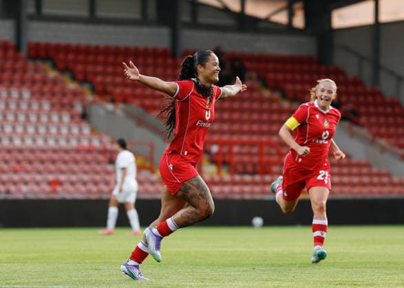Wrexham, Wales, 22nd July 2026. Natasha Thomas of Wrexham celebrates scoring their sides fourth goal during the Pyunik v Wrexham Women UEFA Womens Champions League Qualifying match at The Racecourse, Wrexham. Picture credit should read: Cody Froggatt Sportimage EDITORIAL USE ONLY. No use with unauthorised audio, video, data, fixture lists, club league logos or live services. Online in-match use limited to 120 images, no video emulation. No use in betting, games or single club league player publications. SPI_025_CF_PYUNIK_V_WREXHAM_WOMEN SPI-4881-0025