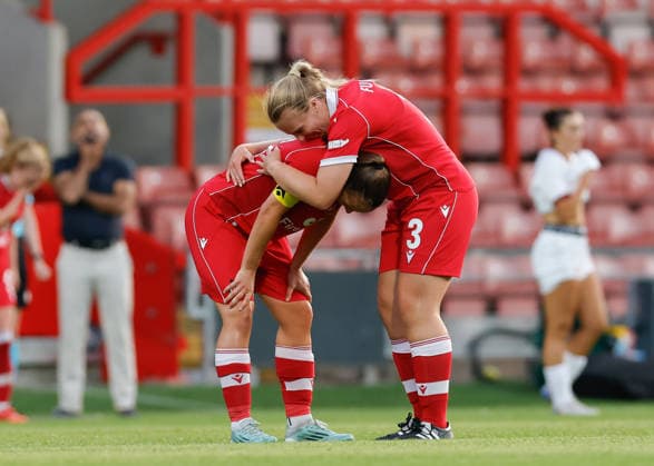 Wrexham, Wales, 22nd July 2026. Lili Jones and Olivia Fuller of Wrexham celebrates the full time result following the Pyunik v Wrexham Women UEFA Womens Champions League Qualifying match at The Racecourse, Wrexham. Picture credit should read: Cody Froggatt Sportimage EDITORIAL USE ONLY. No use with unauthorised audio, video, data, fixture lists, club league logos or live services. Online in-match use limited to 120 images, no video emulation. No use in betting, games or single club league player publications. SPI_027_CF_PYUNIK_V_WREXHAM_WOMEN SPI-4881-0027