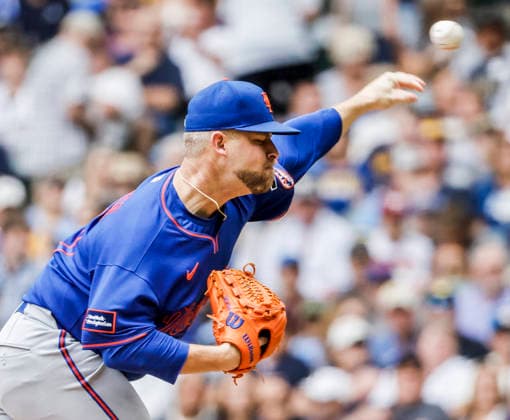 New York Mets relief pitcher A.J. Minter throws in the seventh inning of the MLB, Baseball Herren, USA game between the New York Mets and the Milwaukee Brewers at American Family Field in Milwaukee, Wisconsin on Wednesday July 22, 2026.  MIL20260722830 TANNENxMAURY