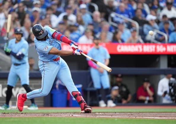 July 22, 2026, Toronto, On, CANADA: Toronto Blue Jays Vladimir Guerrero Jr. (27) hits a double during first inning MLB, Baseball Herren, USA baseball action against the Tampa Bay Rays in Toronto on Wednesday, July 22, 2026. Canada News - July 22, 2026  - ZUMAc35_ 20260722_zaf_c35_115 Copyright: xNathanxDenettex