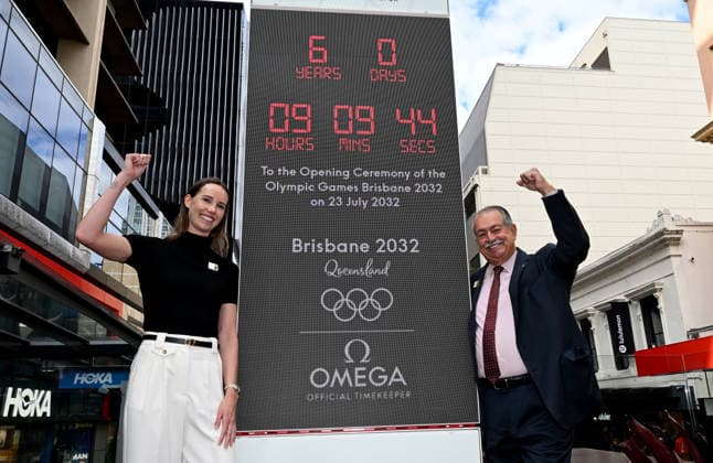 BRISBANE 2032 OLYMPICS, Australian Olympian Emma McKeon (left) and Brisbane 2032 Organising Committee President, Andrew Liveris (right) are seen at the unveiling of the count-down clock marking 6 years until the Brisbane 2032 Olympics, in the Queen Street Mall in Brisbane, Thursday, July 23, 2026. ( NO ARCHIVING BRISBANE QUEENSLAND AUSTRALIA  Copyright: xDARRENxENGLANDx 20260723174674207083