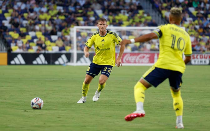 NASHVILLE, TN - JULY 22: Nashville SC midfielder Charles-Emile Brunet (12) makes a pass to Nashville SC forward Hany Mukhtar (10) during a match between Nashville SC and CF MontrÃ al, July 22, 2026 at GEODIS Park in Nashville, Tennessee. (Photo by Matthew Maxey Icon Sportswire) SOCCER: JUL 22 MLS, Fussball Herren, USA Nashville SC vs CF Montreal EDITORIAL USE ONLY Icon26072204