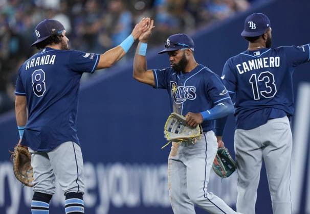 July 22, 2026, Toronto, On, CANADA: Tampa Bay Rays Cedric Mullins, centre, celebrates with Jonathan Aranda (8) after defeating the Toronto Blue Jays in MLB, Baseball Herren, USA baseball action in Toronto on Wednesday, July 22, 2026. Canada News - July 22, 2026  - ZUMAc35_ 20260722_zaf_c35_128 Copyright: xNathanxDenettex