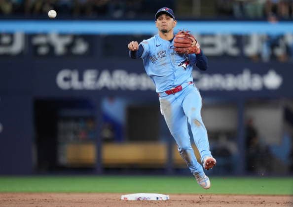 July 22, 2026, Toronto, On, CANADA: Toronto Blue Jays shortstop Andres Gimenez makes a leaping throw to first base to get an out against the Tampa Bay Rays during ninth inning MLB, Baseball Herren, USA baseball action in Toronto on Wednesday, July 22, 2026. Canada News - July 22, 2026  - ZUMAc35_ 20260722_zaf_c35_131 Copyright: xNathanxDenettex