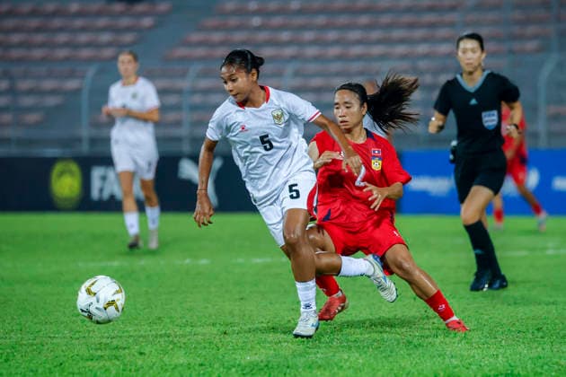 July 22, 2026, Kuala Lumpur, Malaysia: Remini Rumbewas of Indonesia and Vilinthone Vongsengthong of Laos seen in action during the AFF Women s Cup 2026 Final match between Indonesia and Laos at Kuala Lumpur Football Stadium. Final score; Indonesia 5 : 0 Laos. AFF Women s Cup 2026 Indonesia Vs Laos In Kuala Lumpur, Malaysia - 22 JULY 2026.  - ZUMAs197 20260722_aaa_s197_299 Copyright: xWongxFokxLoyx
