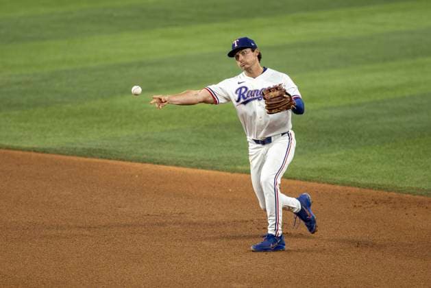 July 22, 2026, Arlington, Texas, USA: Texas Rangers second baseman JUSTIN FOSCUE (14) throws the runner out at first base against the Chicago White Sox at Globe Life Field. White Sox win 4-2. MLB, Baseball Herren, USA 2026: White Sox 4:2 Rangers  - ZUMAf180 20260722_zsp_f180_014 Copyright: xMarkxFannx