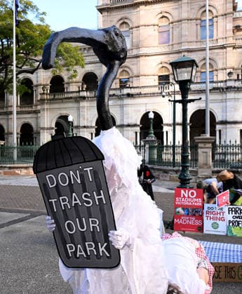 OLYMPICS MONEY BURNING 2032 BBQ, A person dressed as a Ibis is seen during a protest against the 2032 Brisbane Olympics are seen during a Olympics Money Burning BBQ protest that marks 6 years until the Brisbane 2032 Olympics, at Queensland Parliament House, in Brisbane, Thursday, July 23, 2026. ( NO ARCHIVING BRISBANE QUEENSLAND AUSTRALIA  Copyright: xDARRENxENGLANDx 20260723179805812982