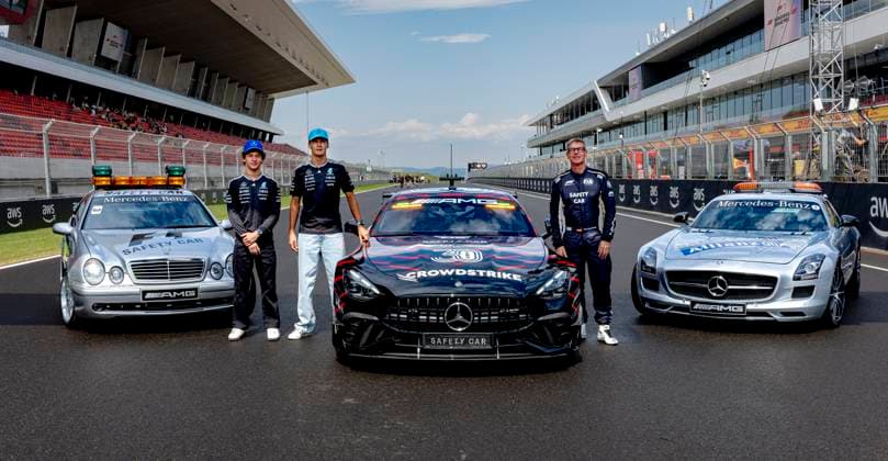 BUDAPEST - Formula 1 driver Kimi Antonelli of Mercedes AMG-Petronas Formula One Team, Formula 1 driver George Russell of Mercedes AMG-Petronas Formula One Team, Safety car driver Bernd Maylander alongside the new safety car during Formula 1 Hungary at the Hungaroring circuit on July 23, 2026 in Budapest, Hungary. (Photo by DeFodi Images) - *** BUDAPEST: Formula 1 driver Kimi Antonelli of the Mercedes AMG Petronas Formula One Team, Formula 1 driver George Russell of the Mercedes AMG Petronas Formula One Team, and safety car driver Bernd Maylander alongside the new safety car during the Formula 1 Hungarian Grand Prix at the Hungaroring circuit on July 23, 2026 in Budapest, Hungary. Photo by DeFodi Images