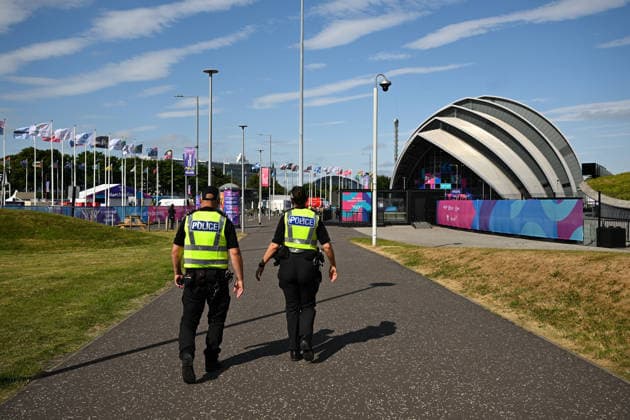 COM26 COLOUR, Police patrol outside the Scottish Event Campus (SEC) ahead of the XXIII Commonwealth Games in Glasgow, Scotland, Thursday, July 23, 2026. ( NO ARCHIVING, EDITORIAL USE ONLY GLASGOW UNITED KINGDOM  Copyright: xLUKASxCOCHx 20260723177891379825