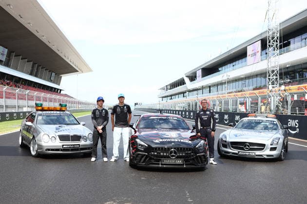 F1 Hungarian Gran Prix Andrea Kimi Antonelli of Mercedes-AMG F1 Team (L) , George Russell of Mercedes AMG Petronas F1 Team (C) and Safety Car driver Bernd Maylander pose for a photo during previews ahead of the F1 Grand Prix of Hungary at Hungaroring on July 23, 2026 in Mogyorod, Hungary. Mogyorod Hungaroring Hungary Copyright: xMarcoxCanonierox