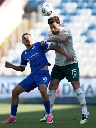 Jack Iredale of Hibernian and Laurent Xhylani of Malisheva Malisheva v Hibernian, UEFA Conference League, 2nd Qualifying Round, 1st Leg, Football, Liman Gegaj Stadium, Malisheva, Kosovo - 23 Jul 2026Malisheva Liman Gegaj Stadium Kosovo United Kingdom  Copyright: xNikolaxKrstic Shutterstockx 16999261aa