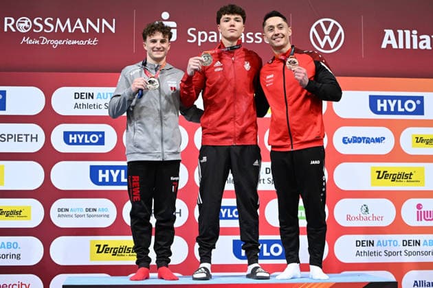 Siegerehrung - Radomyr Stelmakh (SC Cottbus Turnen) gewinnt vor Alexander Kunz (TSV Pfuhl) und Andreas Toba (Turn-Klubb zu Hannover 1858) DIE FINALS 2026 - Deutsche Meisterschaften Geraeteturnen Mehrkampf Maenner, 23.07.2026 DIE FINALS 2026 - Deutsche Meisterschaften Geraeteturnen Mehrkampf Maenner, 23.07.2026 Hannover *** Awards Ceremony: Radomyr Stelmakh (SC Cottbus Turnen) wins ahead of Alexander Kunz (TSV Pfuhl) and Andreas Toba (Turn Klubb zu Hannover 1858) at THE FINALS 2026 German Artistic Gymnastics All-Around Championships for Men, July 23, 2026 THE FINALS 2026 German Artistic Gymnastics Championships Men’s All-Around, July 23, 2026 Hanover Copyright: xEibner-Pressefoto xHoepnerx EP_PHR