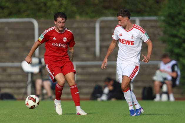 Maik Marquardt (SV Bergisch Gladbach 09) und Luca Waldschmidt (1. FC Köln) im Zweikampf waehrend des Testspiels zwischen 1. FC Köln und SV Bergisch Gladbach 09, Belkaw Arena am 23. July 2026 in Bergisch Gladbach, Deutschland. (Foto von Oliver Kaelke DeFodi Images) +++ Maik Marquardt (SV Bergisch Gladbach 09) und Luca Waldschmidt (1. FC Köln) battle for the ball during the friendly match between 1. FC Köln and SV Bergisch Gladbach 09 at Belkaw Arena on July 23, 2026 in Bergisch Gladbach, Germany. (Photo by Oliver Kaelke DeFodi Images) (Photo by Oliver Kaelke DeFodi Images) - *** Maik Marquardt of SV Bergisch Gladbach 09 and Luca Waldschmidt of 1 FC Köln battle for the ball during the friendly match between 1 FC Köln and SV Bergisch Gladbach 09 at Belkaw Arena on July 23, 2026, in Bergisch Gladbach, Germany Photo by Oliver Kaelke, DeFodi Images Maik Marquardt of SV Bergisch Gladbach 09 and Luca Waldschmidt of 1 FC Köln battle for the ball during the friendly match between 1 FC Köln and SV Bergisch Gladbach 09 at Belkaw Arena on July 23, 2026 in Bergisch Gladbach, Germany Photo by Oliver Kaelke DeFodi Images Photo by Oliver Kaelke DeFodi Images