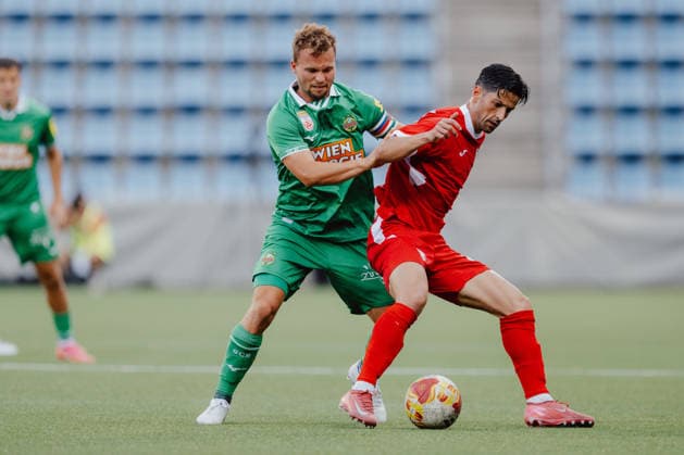 SOCCER - UEFA ECL, Santa Coloma vs Rapid ANDORRA LA VELLA,ANDORRA,23.JUL.26 - SOCCER - UEFA Conference League, qualification, FC Santa Coloma vs SK Rapid Wien. Image shows Matthias Seidl (Rapid) and Inigo Barrenechea (Santa Coloma).  GEPAxpictures xAlexanderxSolc