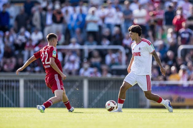 BERGISCH GLADBACH, GERMANY - JULY 23: Kristiyan Irmiev (1. FC Koeln, 43) controls the ball against Ole Tillmann (SV Bergisch Gladbach, 22) during the second friendly game of season 2026 27 between SV Bergisch Gladbach vs. 1. FC Koeln at BELKAW ARENA on July 23, 2026 in Bergisch Gladbach, Germany. North Rhine Westphalia Germany Copyright: xSteffiexWunderlx