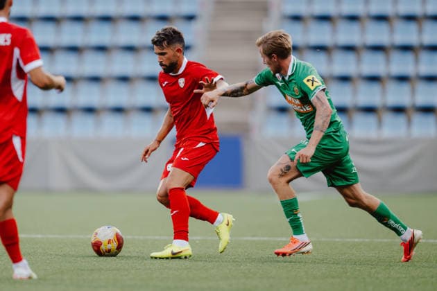 SOCCER - UEFA ECL, Santa Coloma vs Rapid ANDORRA LA VELLA,ANDORRA,23.JUL.26 - SOCCER - UEFA Conference League, qualification, FC Santa Coloma vs SK Rapid Wien. Image shows Inigo Barrenechea (Santa Coloma) and Tonni Adamsen (Rapid).  GEPAxpictures xAlexanderxSolc