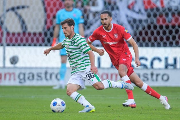 2026-07-23 FC Twente v Ferencvaros FC - UEFA Europa League ENSCHEDE, NETHERLANDS - JULY 23: Gabi Kanichowsky of Ferencvaros TC, Ramiz Zerrouki of FC Twente during the UEFA Europa League match between FC Twente and Ferencvaros FC at De Grolsch Veste on July 23, 2026 in Enschede, Netherlands. Enschede De Grolsch Veste Netherlands Content not available for redistribution in The Netherlands directly or indirectly through any third parties. Copyright: xDennisxBresserx