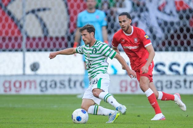2026-07-23 FC Twente v Ferencvaros FC - UEFA Europa League ENSCHEDE, NETHERLANDS - JULY 23: Gabi Kanichowsky of Ferencvaros TC, Ramiz Zerrouki of FC Twente during the UEFA Europa League match between FC Twente and Ferencvaros FC at De Grolsch Veste on July 23, 2026 in Enschede, Netherlands. Enschede De Grolsch Veste Netherlands Content not available for redistribution in The Netherlands directly or indirectly through any third parties. Copyright: xDennisxBresserx