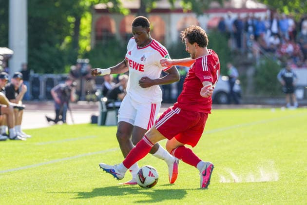 23.07.2026, xydrx, Fußball, Testspiel, SV Bergisch Gladbach 09 - 1.FC Köln, Saison 2026 2027, BELKAW-Arena: Ragnar Ache (1.FC Köln, 9) im Zweikampf gegen Maik Marquardt (SV Bergisch Gladbach 09, 4) DFB regulations prohibit any use of photographs as image sequences and or quasi-video. *** July 23, 2026, xydrx, Soccer, Friendly Match, SV Bergisch Gladbach 09 vs. 1 FC Köln, 2026–2027 Season, BELKAW Arena Ragnar Ache 1 FC Köln, 9 in a tackle against Maik Marquardt of SV Bergisch Gladbach 09, 4 DFB regulations prohibit any use of photographs as image sequences and or quasi-video Copyright: HMBxMedia YannisxDreimann