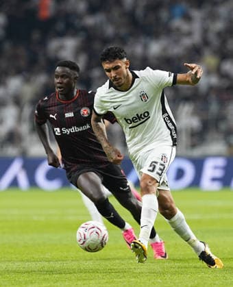 Besiktas v Midtjylland - UEFA Europa League second qualifying round ISTANBUL, TURKIYE - JULY 23: Emirhan Topcu (53) of Besiktas competes against Pedro Bravo (L) of Midtjylland during the UEFA Europa League second qualifying round first leg match between Besiktas and Midtjylland at Tupras Stadium in Istanbul, Turkiye on July 23, 2026. Esra Bilgin Anadolu Istanbul Turkey. Editorial use only. Please get in touch for any other usage.  Copyright: x2026xAnadoluxEsraxBilginx