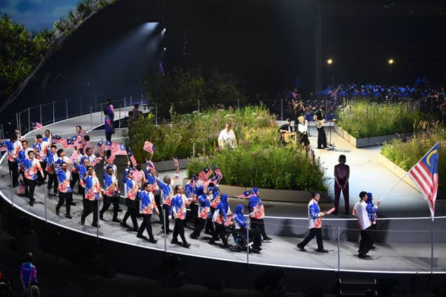 COM26 OPENING CEREMONY, Malaysia walk into the stadium during the Opening Ceremony of the Glasgow 2026 Commonwealth Games at The Hydro in Glasgow, Scotland, Thursday, July 23, 2026. ( NO ARCHIVING, EDITORIAL USE ONLY GLASGOW UNITED KINGDOM  Copyright: xJOELxCARRETTx 20260724119215157460