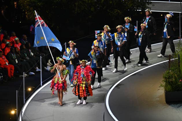 COM26 OPENING CEREMONY, Tuvalu walk into the stadium during the Opening Ceremony of the Glasgow 2026 Commonwealth Games at The Hydro in Glasgow, Scotland, Thursday, July 23, 2026. ( NO ARCHIVING, EDITORIAL USE ONLY GLASGOW UNITED KINGDOM  Copyright: xLUKASxCOCHx 20260724175946347770