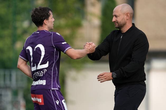 Latvia Soccer FK Liepaja Austria Wien, Riga, Latvia, 23.07.2026, football, soccer Head coach of FK Austria Wien Stephan Helm and Florian Wustinger celebrate during the UEFA Europa Conference League qualifying round game between Latvia™s FK Liepaja and Austria Wien teams in Sloka, Latvia 23.07.2026. Photo: Roman Koksarov (RKF) Riga Latvia Copyright: xRomanxKoksarovx RKV00874.JPG