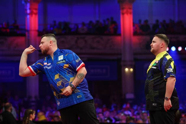 RECORD DATE NOT STATED 23rd July 2026, Winter Gardens, Blackpool, Lancashire, England; 2026 Betfred World Matchplay Darts, Day Six; Josh Rock in action as Luke Littler looks on AidanxHunter